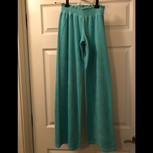 Turquoise Juicy Couture terry sweatpants.